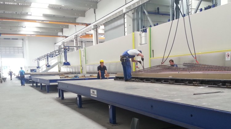 Modernization of a pallet carousel system for precast concrete