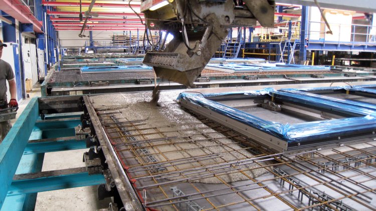 Concrete pouring in a pallet carousel system